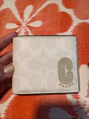 Coach Men’s White Leather Bifold Wallet with Raised Logo